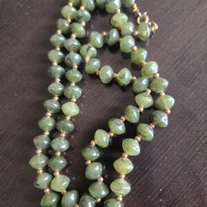 Vtg. beaded necklace, jade colored beads/gold colored beads. Approx. 26".